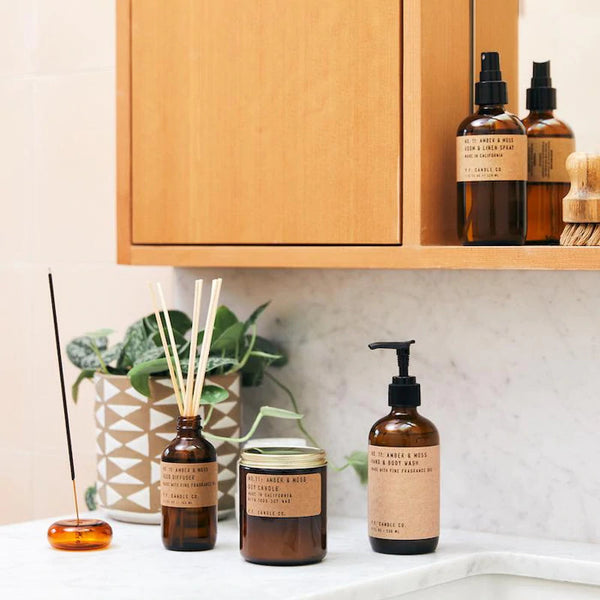 no. 11 amber and moss linen spray in amber glass bottle, by Californian PF Candle Co. Available at cuemars.com