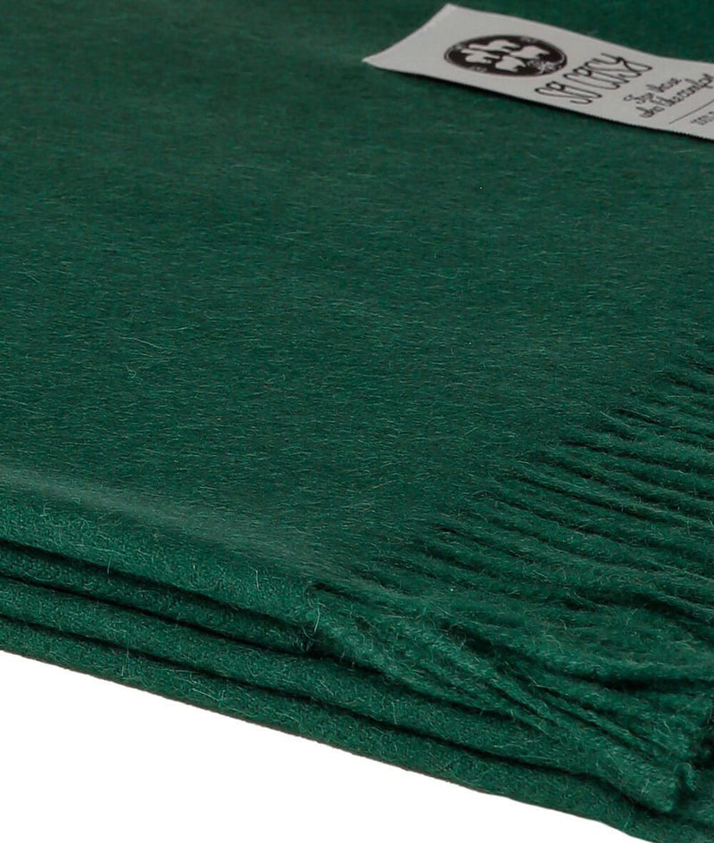 Close up Woven British Racing Green Baby Alpaca soft blanket designed in the UK by So Cosy