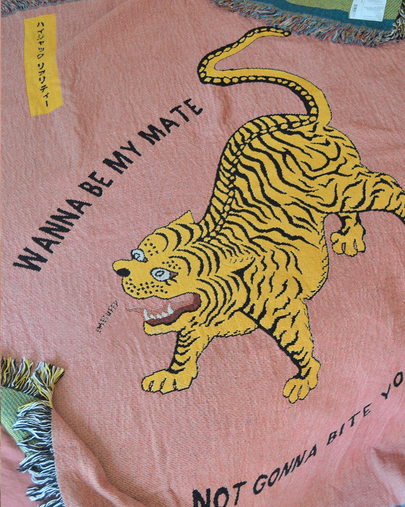 Close Up Picture of jacquard woven tiger cotton throw by East London Digital Illustration Studio Goodbond in collaboration with Cuemars