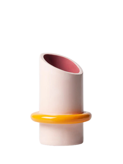 pink and yellow ceramic vase with a big yellow ring on the bottom, by ceramicist Ariana de Luca. Available at www.cuemars.com