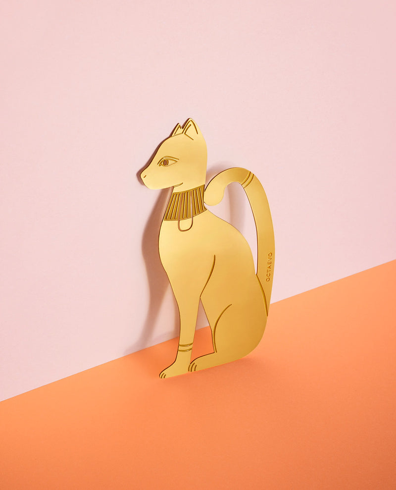 Picture of a finely-cut metal gold cat bookmark by Octaevo available at cuemars.com