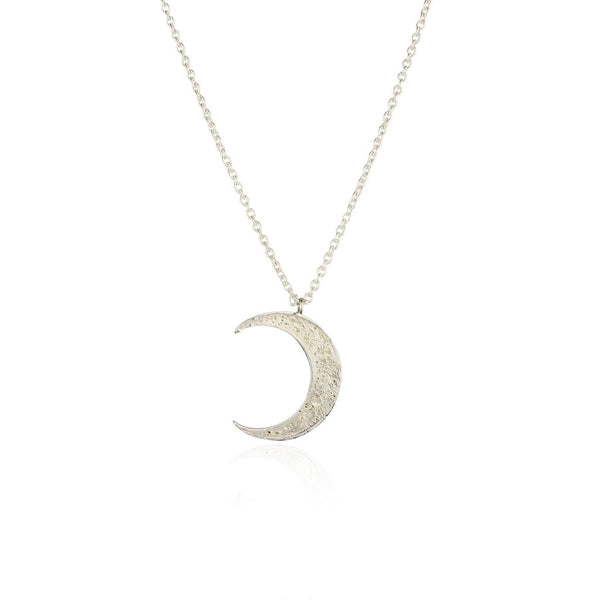 crescent moon necklace with intricate details of the moon craters made by hand by Japanese designer Momocreatura