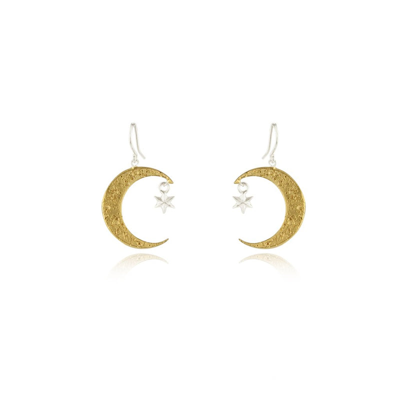 Detailed gold plated crescent moon earrings with hand carved craters and a pendant silver star. Designed and made by Momocreatura in London.