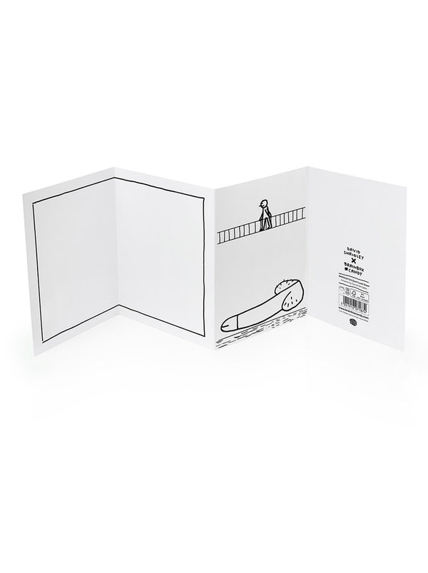 Concertina card featuring a man crossing a bridge that has an illustration of a large penis below the bridge with blank space to write a message on. By Scottish artist David Shrigley