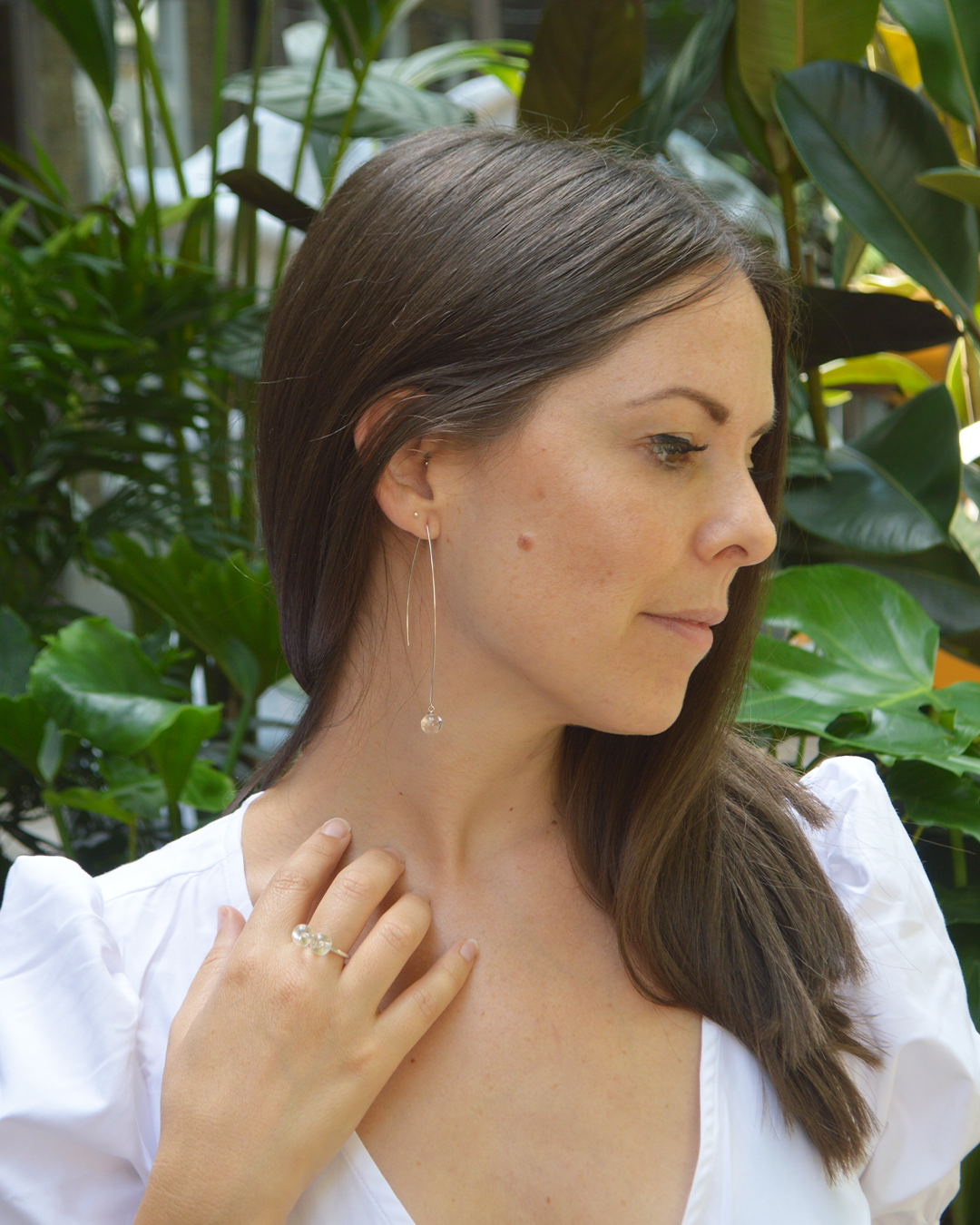 lifestyle picture of deborah tseng double sphere ring in rock crystal and silver for cuemars