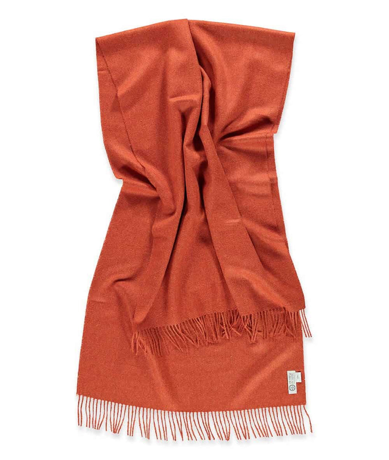 detailed picture of handmade super soft baby alpaca shawl by so cosy in burnt orange available online and at the store
