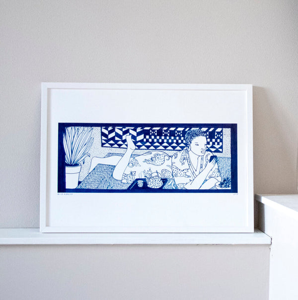 A woman lying down on the floor, reading her phone and enjoying a quiet evening, by French visual artist Elise Esposito. Available at www.cuemars.com
