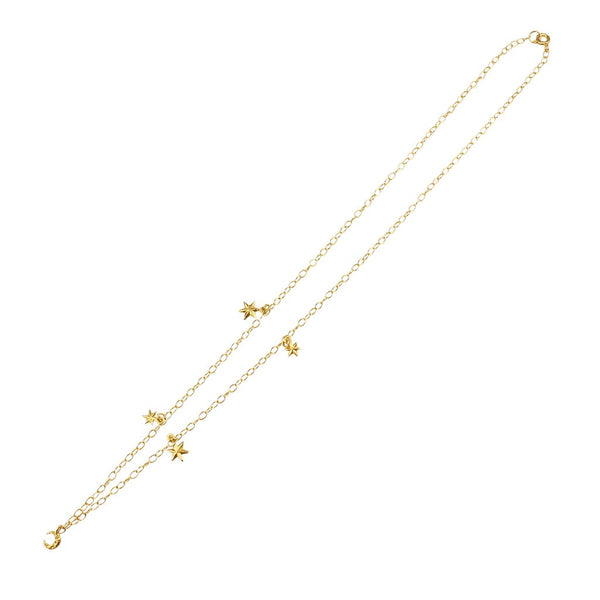 Gold  plated necklace featuring 4 stars and a crescent moon handcrafted by momocreatura in London
