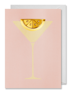 Cocktail glass with a stainless steel lemon bookmark made by Octaevo, available at cuemars.com