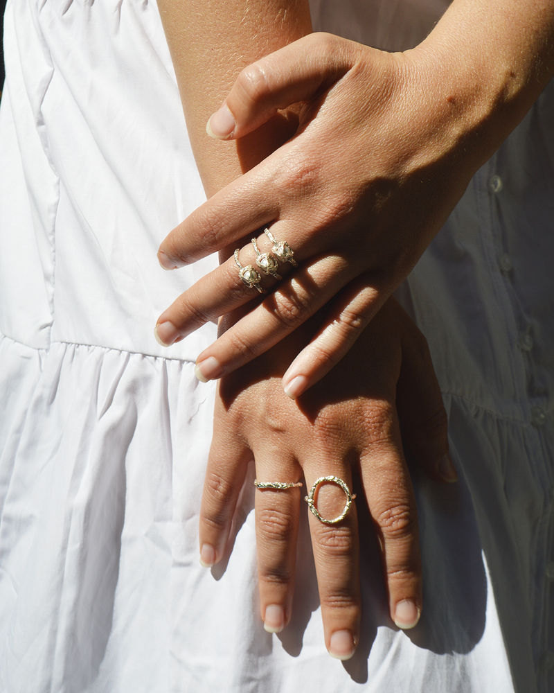 close up of handcrafted statement rings with different stones