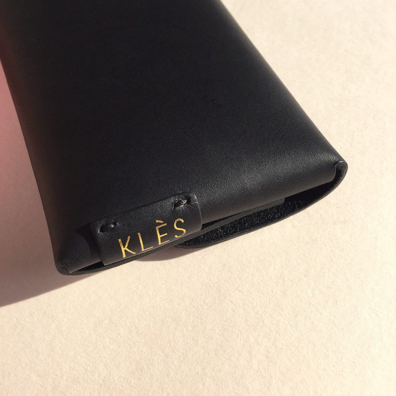 Back of Vegetable tanned leather black card wallet by slow fashion UK brand Kles
