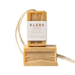 Picture with two citrusy exfoliating soaps on a cotton rope by natural skincare brand Kleen soaps ideal for oily skin
