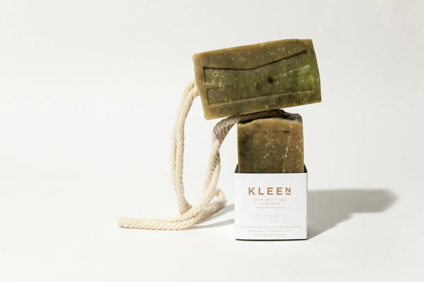 Picture with two Tea Tree oil exfoliating soaps on a cotton rope by natural skincare brand Kleen soaps ideal for oily skin