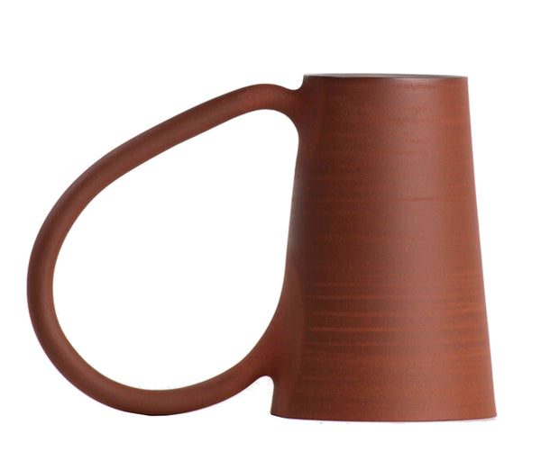 hand thrown coffee mug in red Canadian stoneware in a minimalist design with an oversized handle