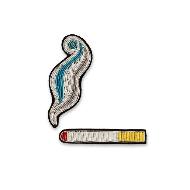 Hand embroidered brooch of a Cigarette + Smoke by French company Macon et Lesquoy, available to purchase at www.cuemars.com