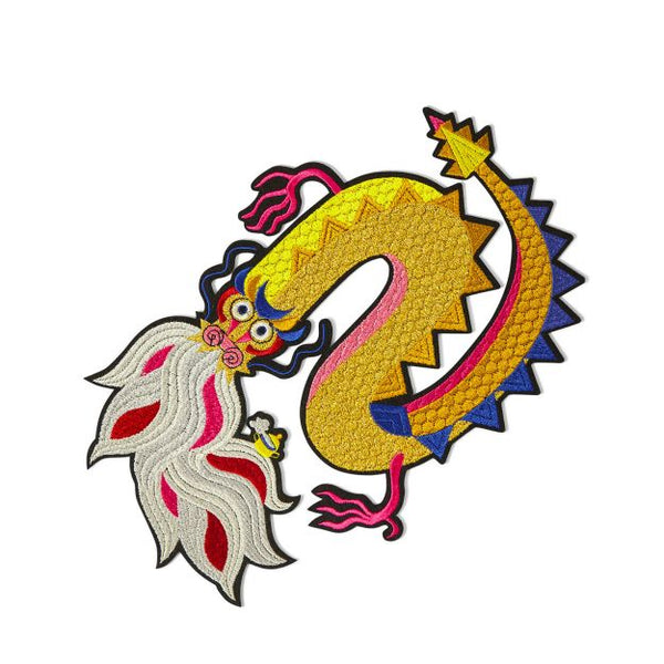 machine embroidered iron-on patch in the shape of an oriental dragon in bright yellows, blues, pinks and reds. Designed by French company Macon et Lesquoy and made in Portugal. Available at www.cuemars.com