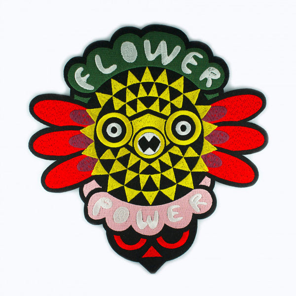 Flower Power iron-on patch in bright colours red, green and yellow designed by Macon et Lesquoy. Available by www.cuemars.com