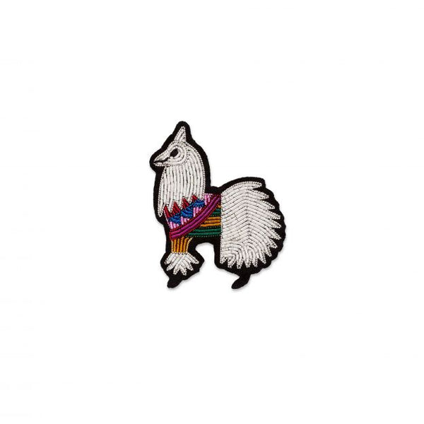 Hand embroidered brooch of a Lama with a sweater by French company Macon et Lesquoy, available to purchase at www.cuemars.com