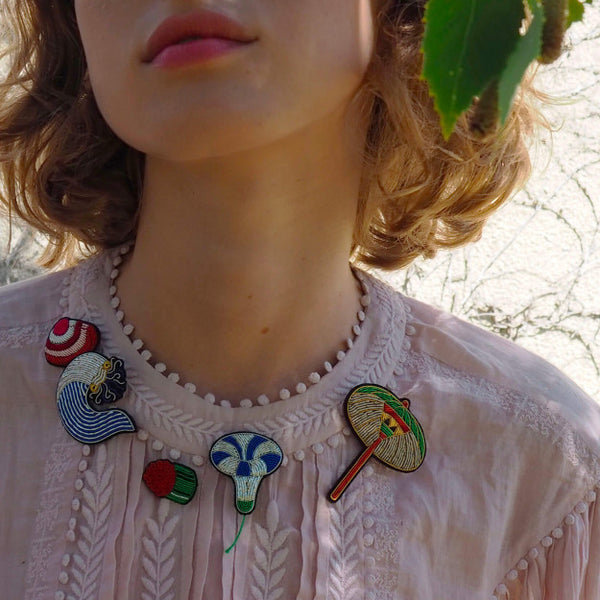 Hand embroidered brooches by French company Macon et Lesquoy, available to purchase at www.cuemars.com