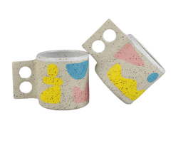 Pink yellow and blue handmade ceramic mug by Minx Factory, available at cuemars.com