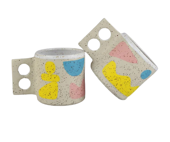 Pink yellow and blue handmade ceramic mug by Minx Factory, available at cuemars.com