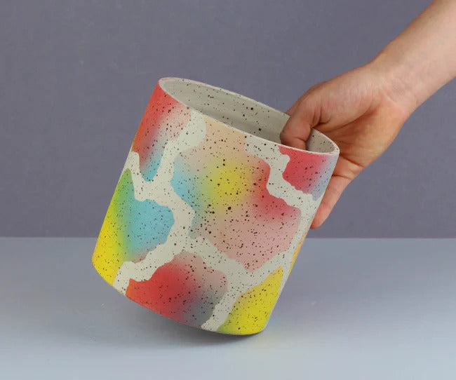 Blue yellow red speckled ceramic planter, hand-thrown in Barcelona by Minx Factory. Available at www.cuemars.com