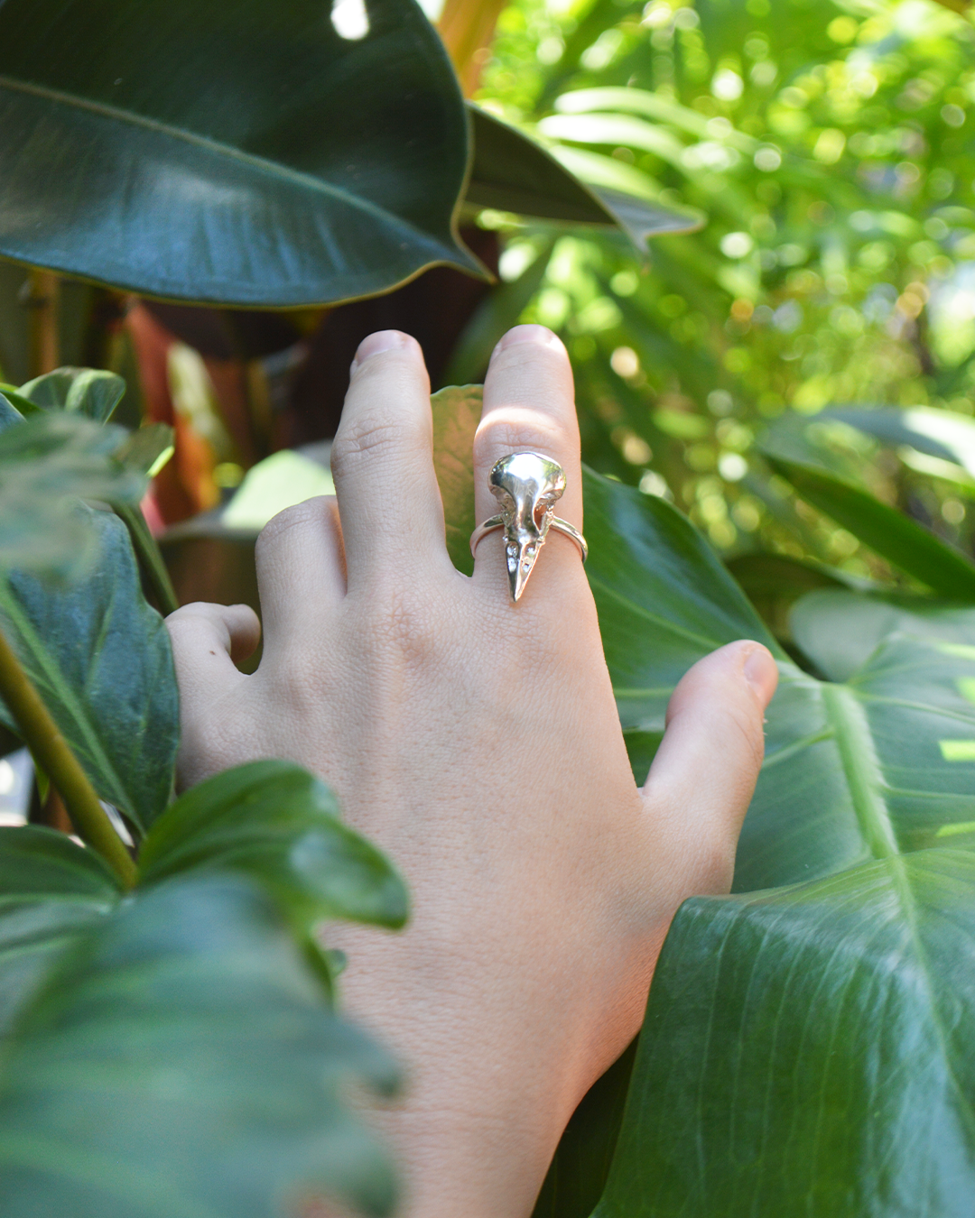Close up details of handmade large bird skull statement ring in sterling silver
