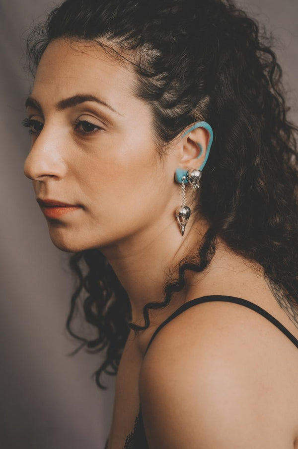 Handmade magpie skull earrings cast in sterling silver by misan jewellery