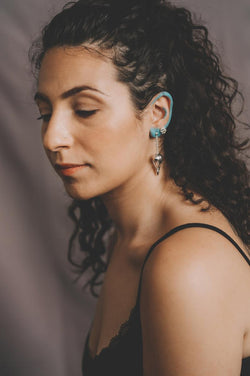 Handmade magpie skull earrings in sterling silver by misan jewellery