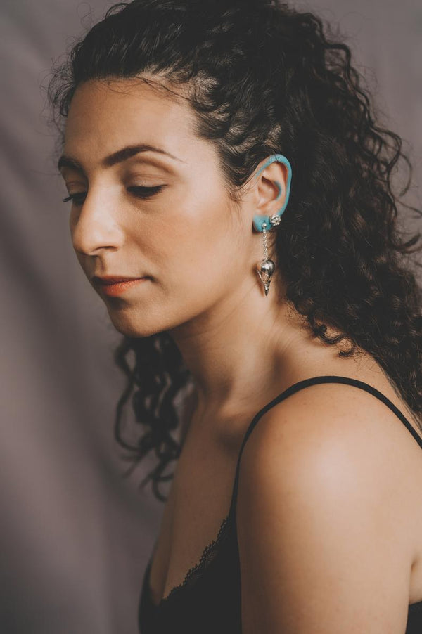 Handmade magpie skull earrings in sterling silver by misan jewellery