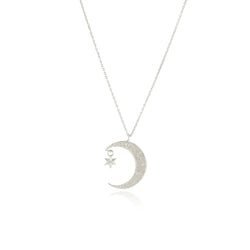 Crescent moon silver necklace with a small hanging  6 point silver star, by Momocreatura. Available at www.cuemars.com