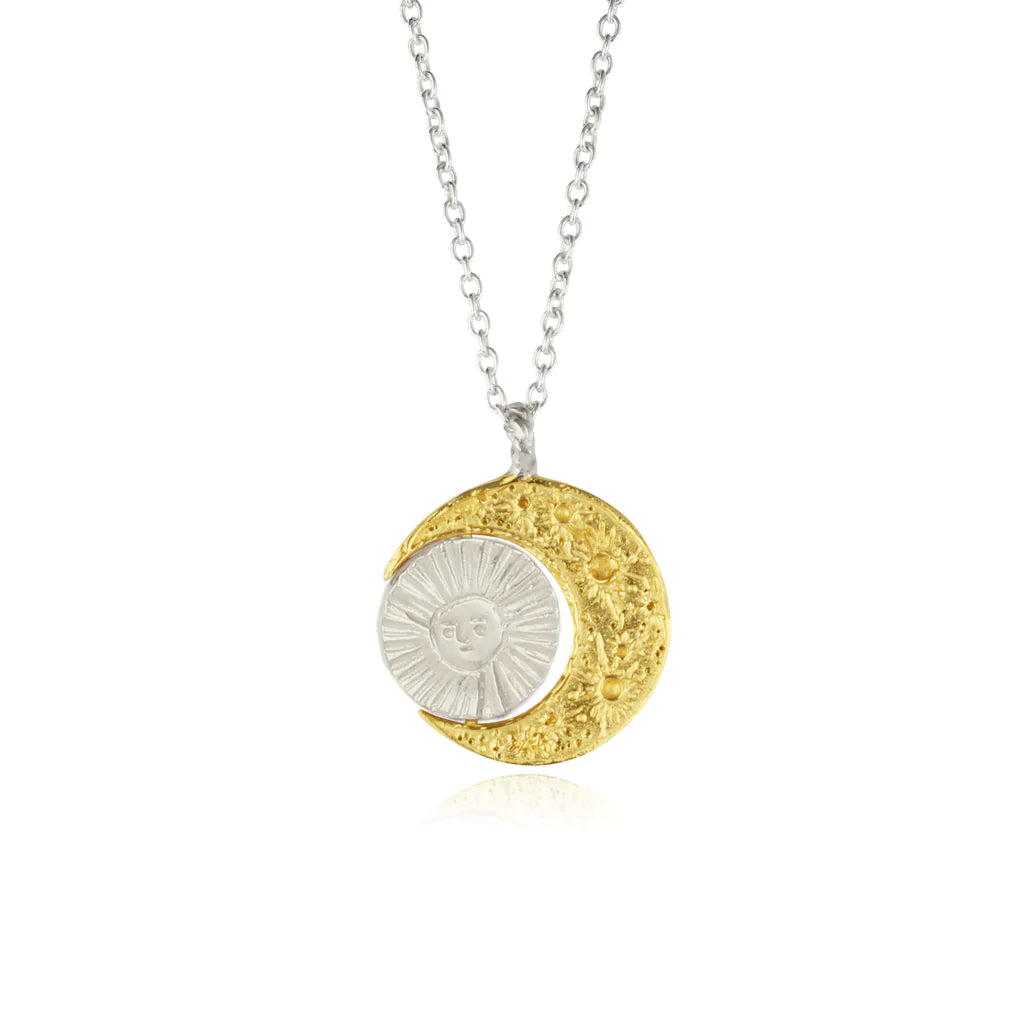 Gold Crescent moon necklace with Intricate moon craters handmade and a silver sun by Momocreatura. Available at www.cuemars.com