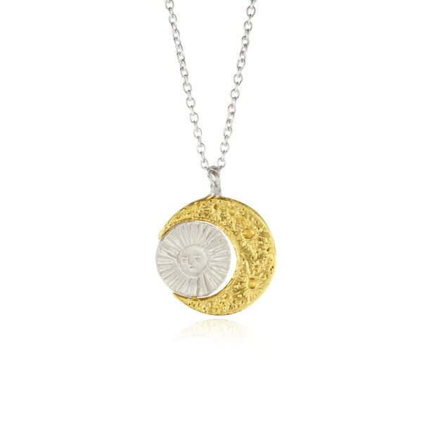 Gold Crescent moon necklace with Intricate moon craters handmade and a silver sun by Momocreatura. Available at www.cuemars.com