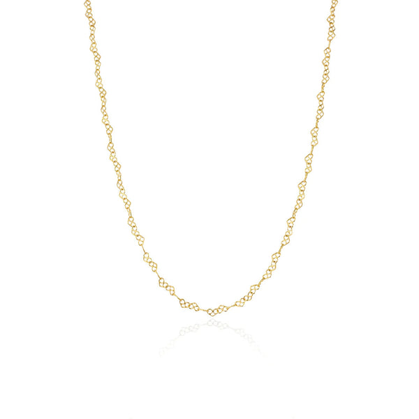 pretzel like hearts linked in a gold plated silver chain, by Momocreatura. Available at www.cuemars.com