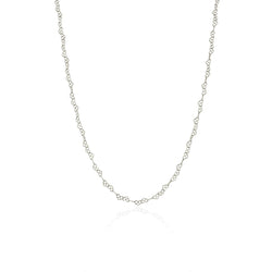 Pretzel like hearts linked in a chain necklace in sterling silver. handcrafted by momocreatura. Available at www.cuemars.com
