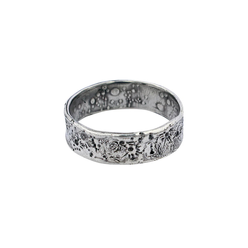 moon crater ring handmade in oxidised silver by London based jewellery designer Momocreatura. Available at www.cuemar.com
