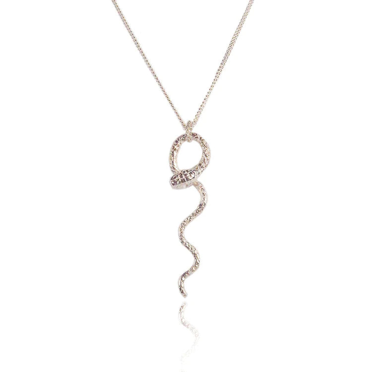 silver snake necklace with intricate skin details made by hand in London by Momocreatura. Avialable at www.cuemars.com