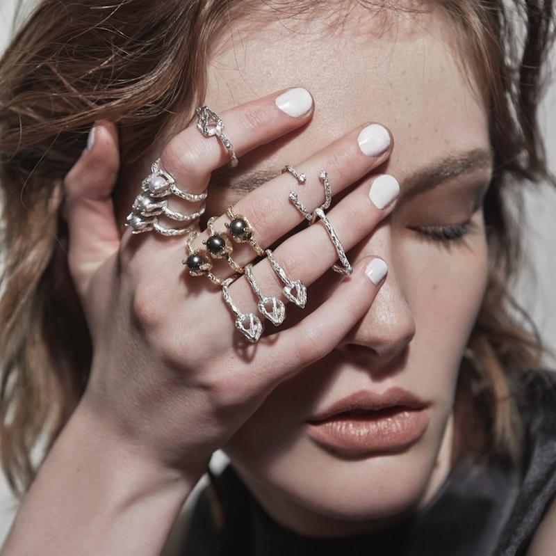 close up of handcrafted statement rings with different stones