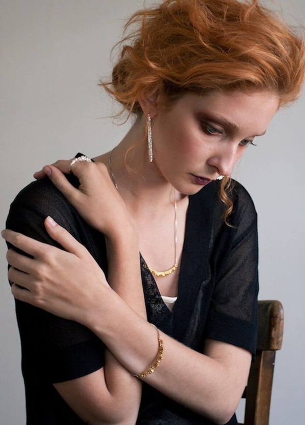 solid silver long oval textured hoop earrings by niza huang available at cuemars.com