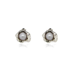 White pearl silver studs made by niza huang, available at www.cuemars.com