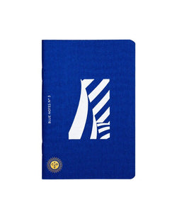 Deep blue pocket notebook with white screen printed illustration on the front and Octaevo's gold stamp, available at cuemars.com