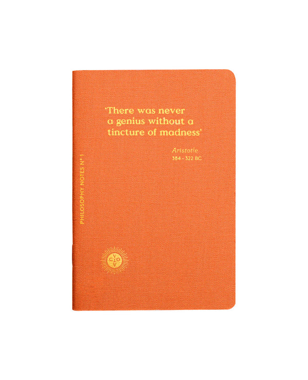 Orange small notebook with a poem screen printed on gold that says There was never a genious without a tincture of madness by Aristotle, designed by Octaevo. Available at www.cuemars.com