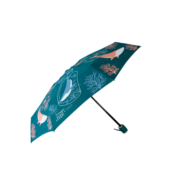 product picture of the Pacific Blue umbrella by French brand Beau Nuage, an umbrella made from recycled plastic bottles aimed to protect our environment as well as keeping us dry from the rain