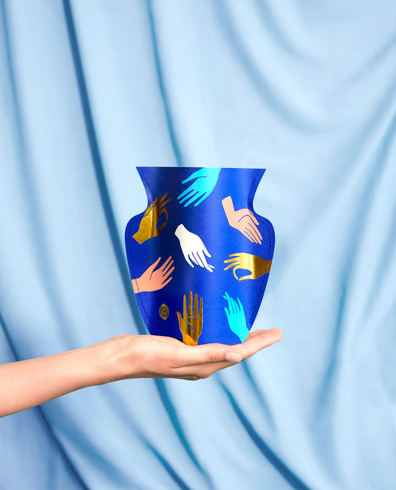 Lifestyle Picture of a handmade waterproof mini paper vase by Barcelona based design studio Octaevo