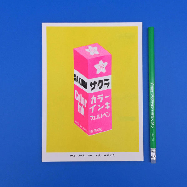 Vibrant risograph print featuring a very bright package of pink Sakura Ink on a yellow background. Designed and printed by Dutch studio We Are Out of Office