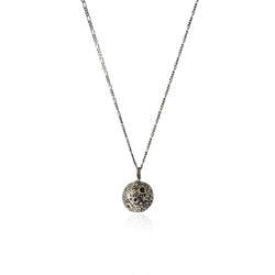 Hand carved moon sphere necklace in oxidised silver by momocreatura london