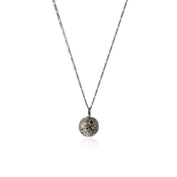 Hand carved moon sphere necklace in oxidised silver by momocreatura london