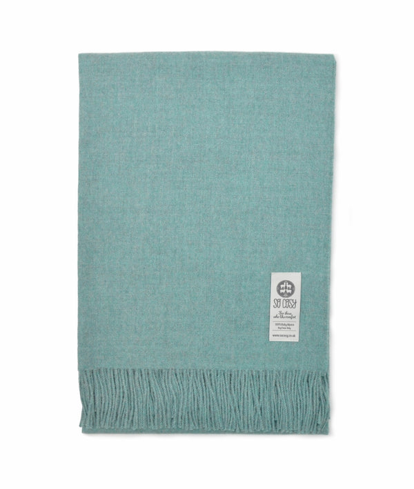 picture of handmade super soft baby alpaca throw by so cosy in pastel blue melange available online and at the store