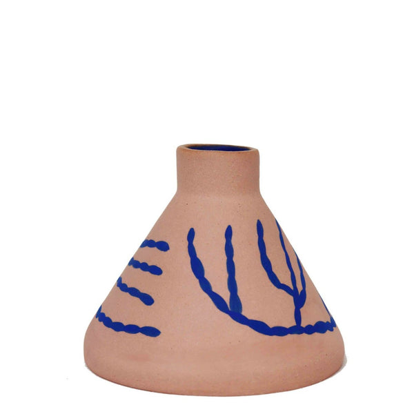 Cone shaped ceramic vase by Hackney based Sophie Alda. Pink vase with hand painted blue illustrations. Available at Cuemars