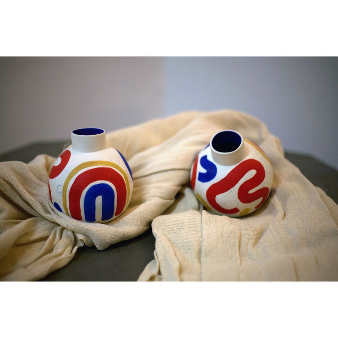 rainbow flower vase handmade by sophie alda in white, blue, ochre and red